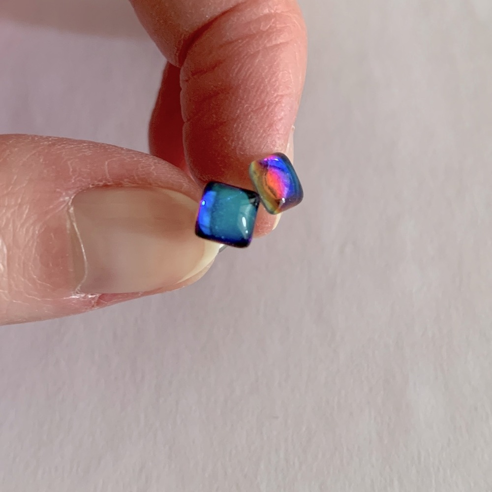 Sterling silver earring stud with iridescent moon stone colored design